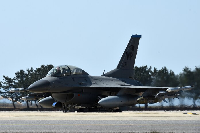 An F-16 Fighting Falcon parks on the flightline at Kunsan Air Base, Republic of Korea, March 22, 2021. The F-16 Fighting Falcon is a compact, multi-role fighter aircraft that is highly maneuverable in air-to-air combat and air-to-surface attack. (U.S. Air Force photo by Senior Airman Suzie Plotnikov)
