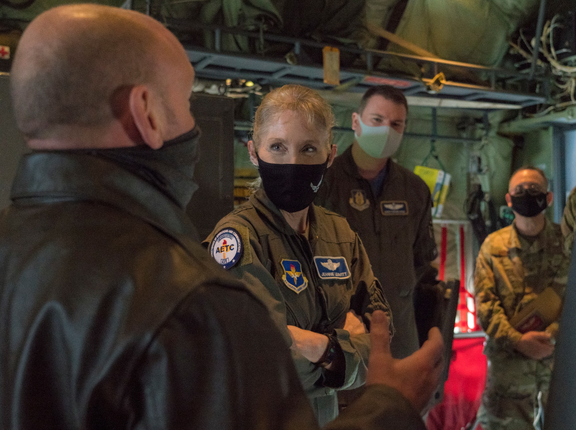 Maj. Gen. Jeannie M. Leavitt, director of operations and communications for the Air and Education Training Command at Joint Base San Antonio-Randolph, Texas, learns about the 53rd Weather Reconnaissance Squadron "Hurricane Hunters" from Tech. Sgt. Zachary Zieman, loadmaster for the 53rd WRS, during a visit to Keesler Air Force Base, Miss., March 19, 2021. After joining the Air Force in 1992, Leavitt became the branch's first female fighter pilot in 1993. She visited the 81st Training Wing and the Air Force Reserve's 403rd Wing, and she spoke to members of Team Keesler during an event recognizing International Women's History Month. (U.S. Air Force photo by Staff Sgt. Kristen Pittman)