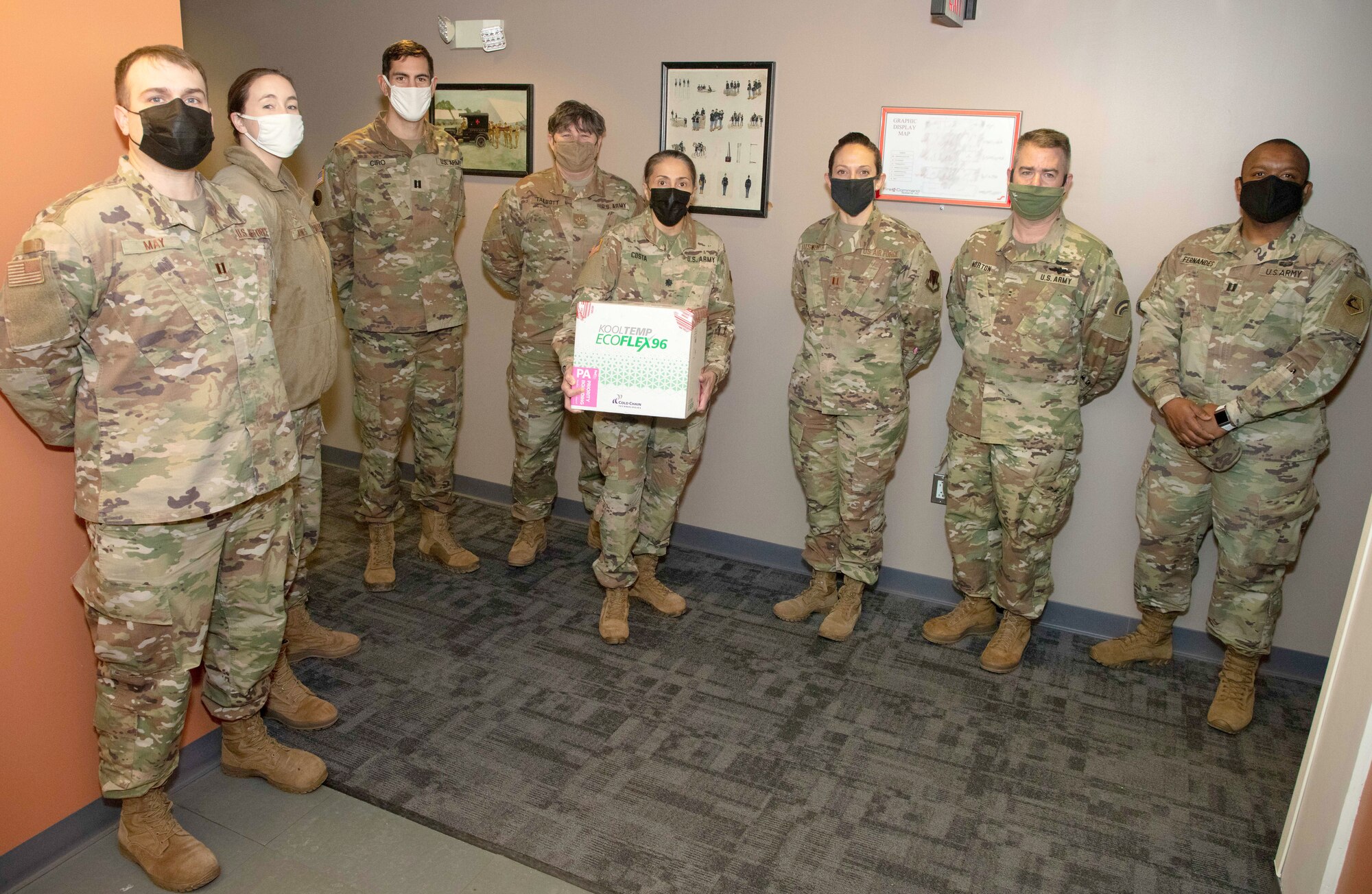 Task Force Remedium receives the first box of the COVID-19 vaccine at Hanscom Air Force Base, Massachusetts, Dec. 30, 2020. The COVID-19 vaccine is currently available to select Soldiers and Airmen based off of risk and mission requirements, but will be available widely as supplies increase. (U.S. Air National Guard courtesy photo)