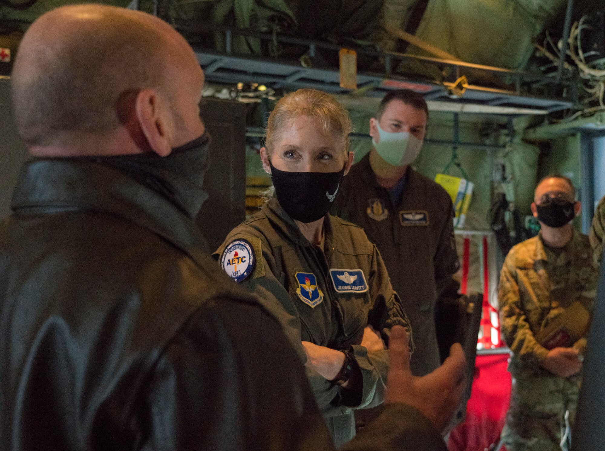 Maj. Gen. Jeannie M. Levitt, director of operations and communications for the Air and Education Training Command at Joint Base San Antonio-Randolph, Texas, learns about the 53rd Weather Reconnaissance Squadron "Hurricane Hunters" from Tech. Sgt. Zachary Zieman, loadmaster for the 53rd WRS, during a visit to Keesler Air Force Base, Miss., March 19, 2021. After joining the Air Force in 1992, Leavitt became the branch's first female fighter pilot in 1993. She visited the 81st Training Wing and the Air Force Reserve's 403rd Wing, and she spoke to members of Team Keesler during an event recognizing International Women's History Month. (U.S. Air Force photo by Staff Sgt. Kristen Pittman)