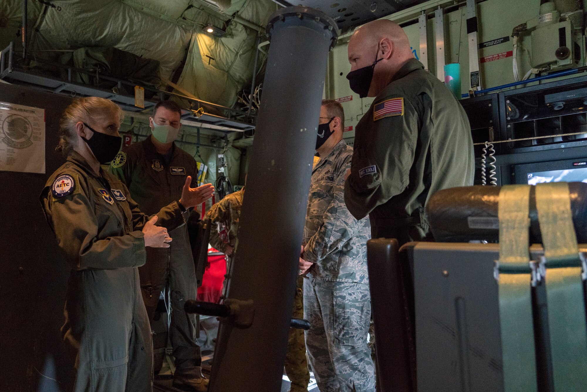 Maj. Gen. Jeannie M. Levitt, director of operations and communications for the Air and Education Training Command at Joint Base San Antonio-Randolph, Texas, asks Master Sgt. Ed Scherzer, a loadmaster for the 53rd Weather Reconnaissance Squadron, a question about the 53rd WRS "Hurricane Hunters" operations during a visit at Keesler Air Force Base, Miss., March 19, 2021. After joining the Air Force in 1992, Leavitt became the branch's first female fighter pilot in 1993. She visited the 81st Training Wing and the Air Force Reserve's 403rd Wing, and she spoke to members of Team Keesler during an event recognizing International Women's History Month. (U.S. Air Force photo by Staff Sgt. Kristen Pittman)