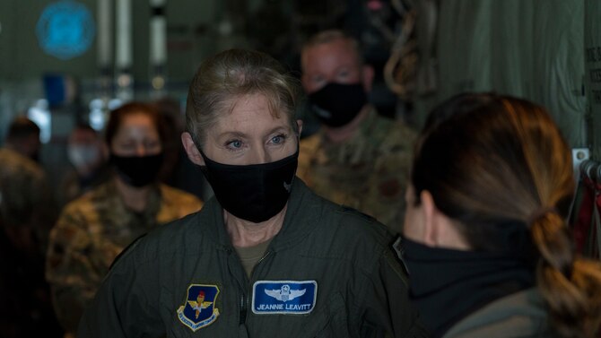 Maj. Gen. Jeannie M. Levitt, director of operations and communications for the Air and Education Training Command at Joint Base San Antonio-Randolph, Texas, learns about the 53rd Weather Reconnaissance Squadron "Hurricane Hunters" from Capt. Peyton Eustis (center), pilot for the 53rd WRS, and Master Sgt. Ed Scherzer (right), loadmaster for the 53rd WRS, during a visit at Keesler Air Force Base, Miss., March 19, 2021. After joining the Air Force in 1992, Leavitt became the branch's first female fighter pilot in 1993. She visited the 81st Training Wing and the Air Force Reserve's 403rd Wing, and she spoke to members of Team Keesler during an event recognizing International Women's History Month. (U.S. Air Force photo by Staff Sgt. Kristen Pittman)