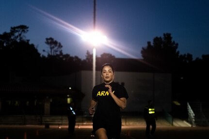A 229th Military Intelligence Battalion Soldier races to the finish of the sprint-drag-carry portion of the Army Combat Fitness Test at the Presidio of Monterey, California, Nov. 1, 2019.