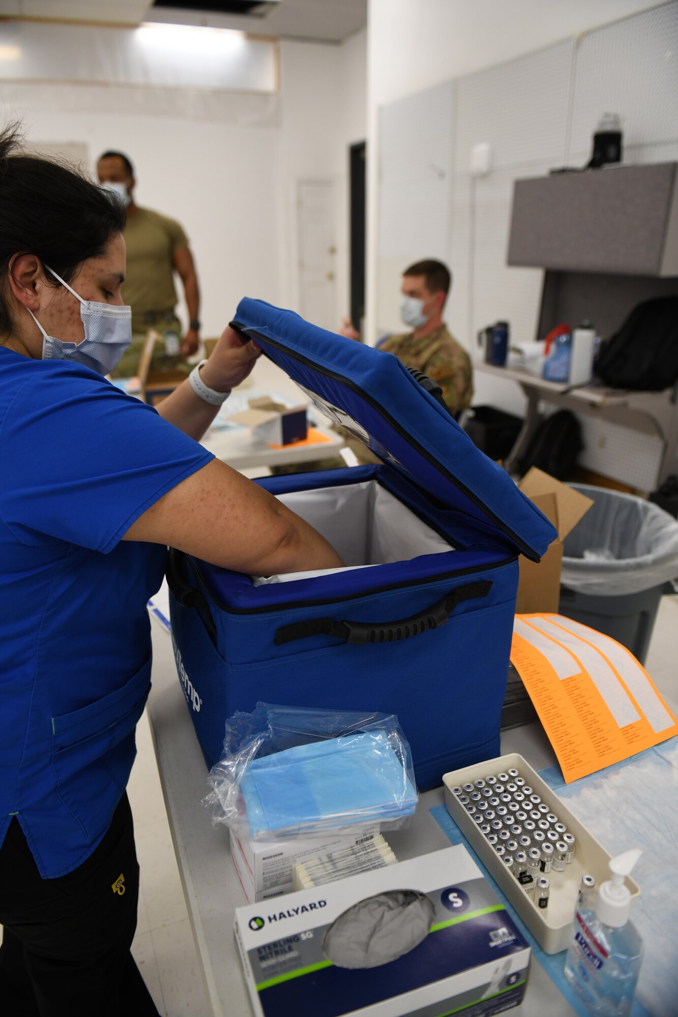 Not today COVID: Volunteers help administer vaccines to base community