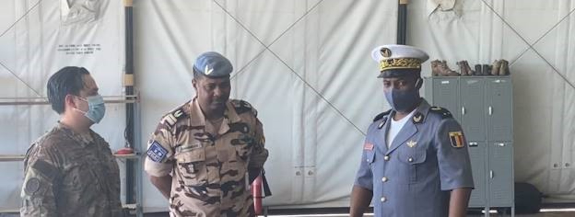 Brig. Gen. Idriss Amine Ahmed, Chadian Air Force chief of staff, right, and Lt. Col. Emmanuel Djangbei, Chadian Joint Intelligence, Surveillance and Reconnaissance Center director, center, congratulate U.S. Air Force Maj. John Harris, 818th Mobility Support Advisory Squadron assistant director of operations, left, on his final flight as a U.S. Air Force pilot March 8, 2021, at Adji Kossei Air Base, N’Djamena, Chad. Harris and air advisors from the 818th MSAS conducted training to accelerate Chadian Air Force peacekeeping and security operations in the region. (U.S. Army photo by Sgt. 1st Class Joshua Prestel)