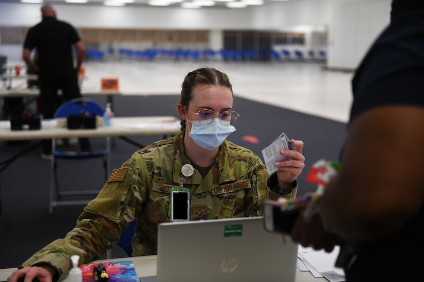 Not today COVID: Volunteers help administer vaccines to base community