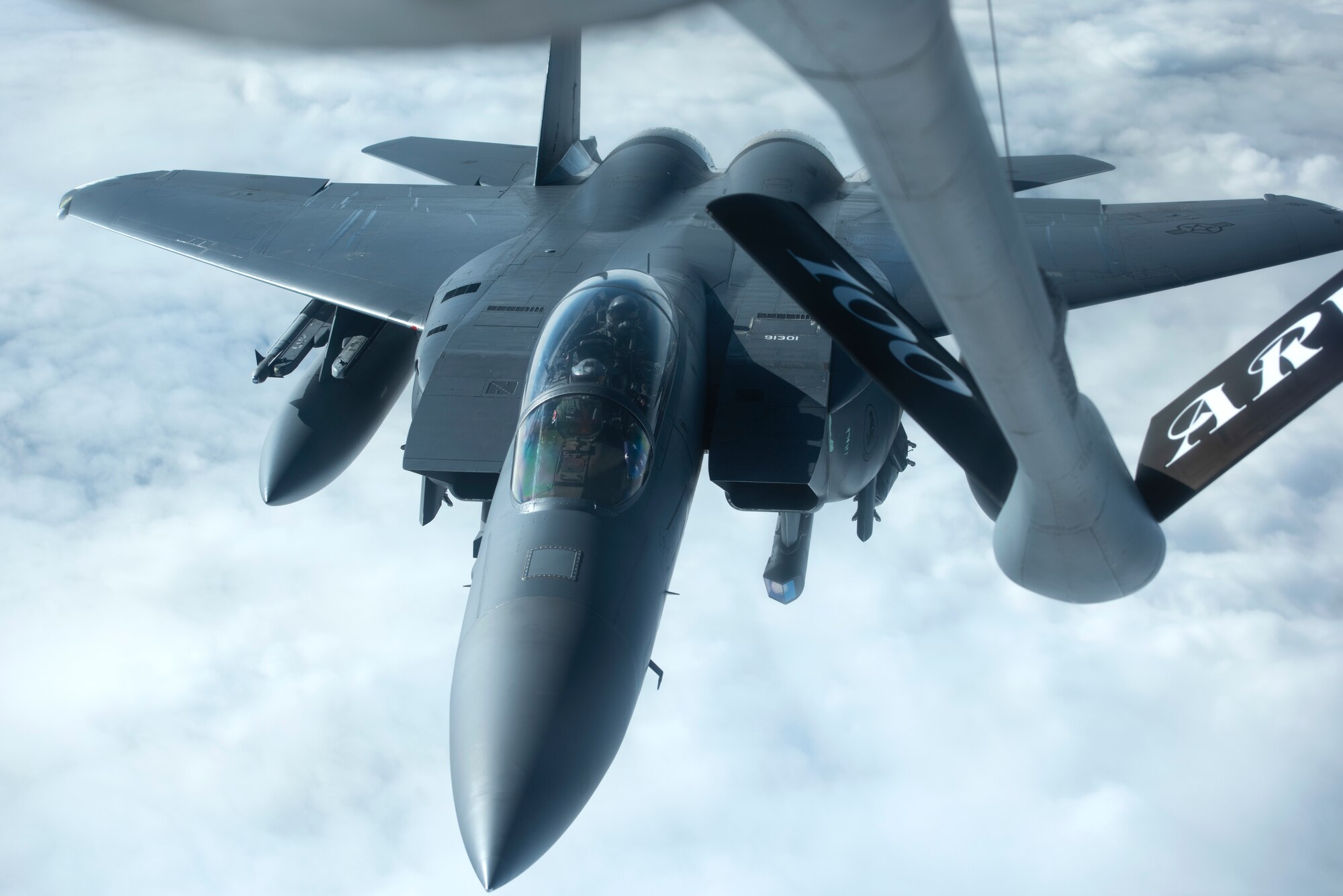 A 48th Fighter Wing F-15E Strike Eagle prepares to connect with a KC-135 Stratotanker for aerial refueling on the way to Amari Air Base, Estonia, in support of exercise Baltic Trident, March 15, 2021. Exercises like this strengthen interoperability with NATO allies and partner nations, and increase 48th FW sortie generation and sustainment capabilities away from home station through the application of Agile Combat Employment concepts. (U.S. Air Force photo by Airman 1st Class Jessi Monte)