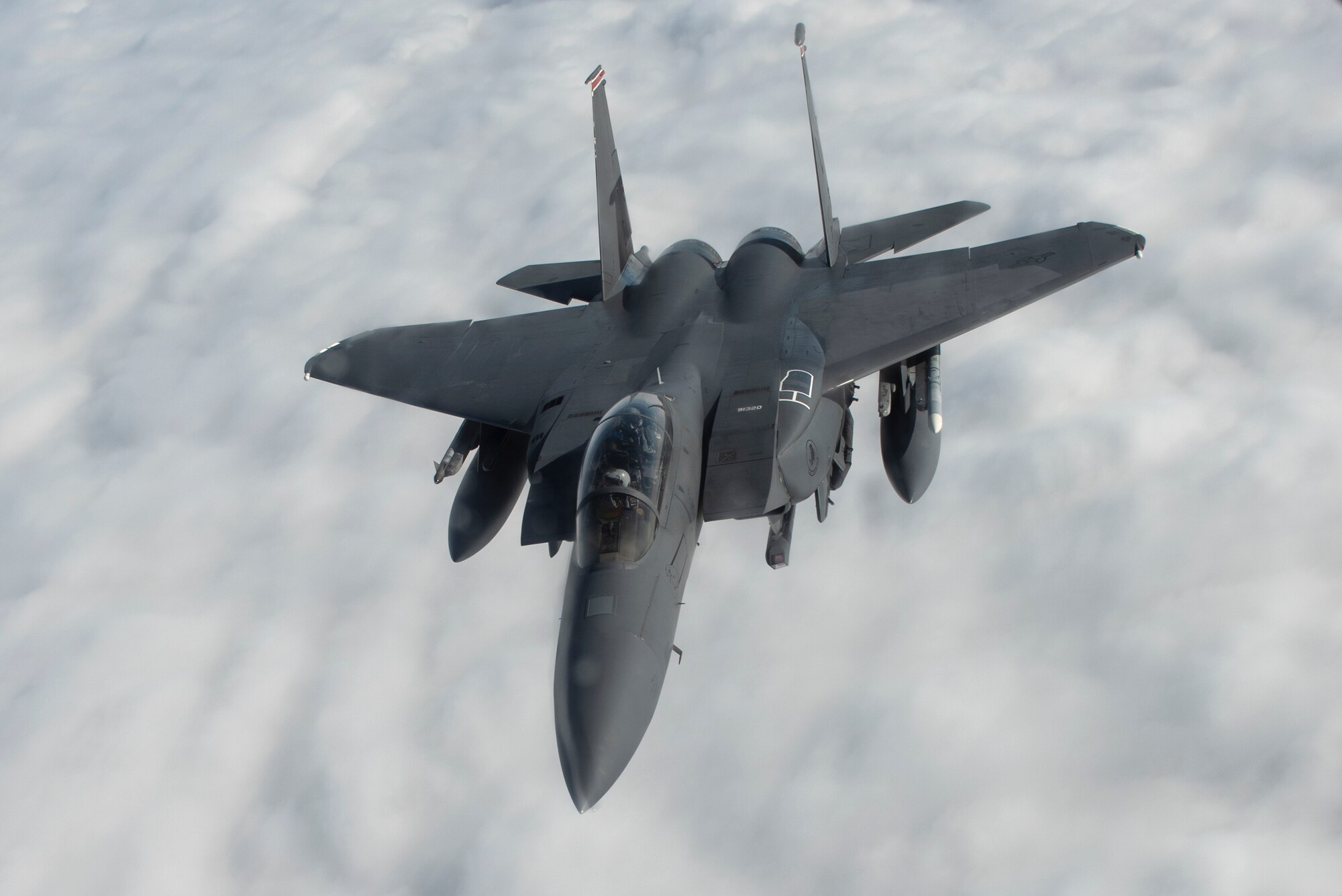 A 48th Fighter Wing F-15E Strike Eagle departs after conducting aerial refueling with a KC-135 Stratotanker on the way to Amari Air Base, Estonia, in support of exercise Baltic Trident, March 15, 2021. Exercises like Baltic Trident strengthen interoperability with NATO allies and partner nations, and increase 48th FW sortie generation and sustainment capabilities away from home station through the application of Agile Combat Employment concepts. (U.S. Air Force photo by Airman 1st Class Jessi Monte)