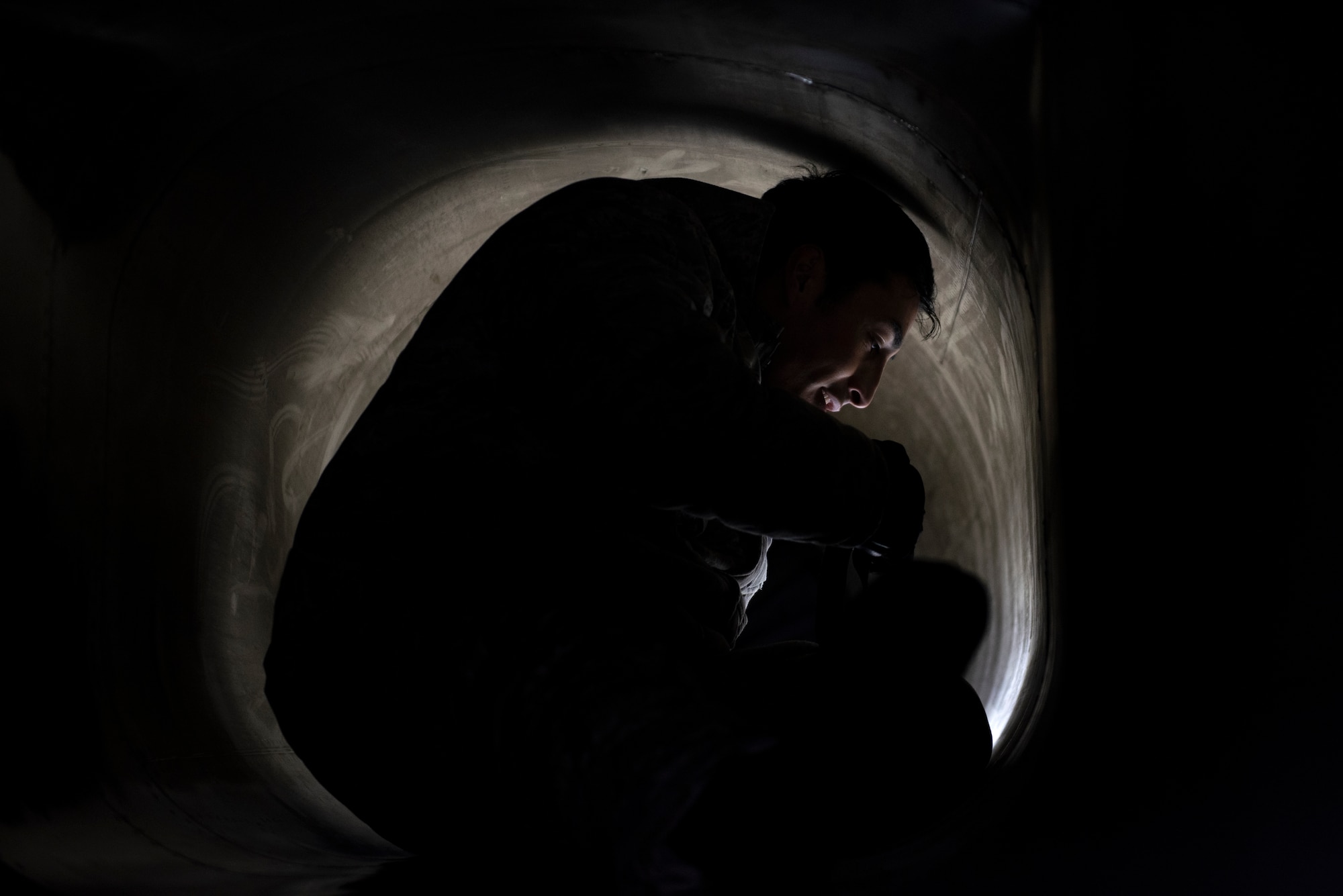 A U.S. Air Force Airman assigned to the 48th Aircraft Maintenance Squadron conducts routine post-flight checks on an F-15C Eagle after arrival at Amari Air Base, Estonia, in support of Exercise Baltic Trident, March 15, 2021. Incorporating Agile Combat Employment concepts into exercises like Baltic Trident increases lethality and enhances interoperability with NATO allies and partner nations, ensuring the ability to counter military aggression and coercion by sharing responsibilities for common defense. (U.S. Air Force photo by Airman 1st Class Jessi Monte)