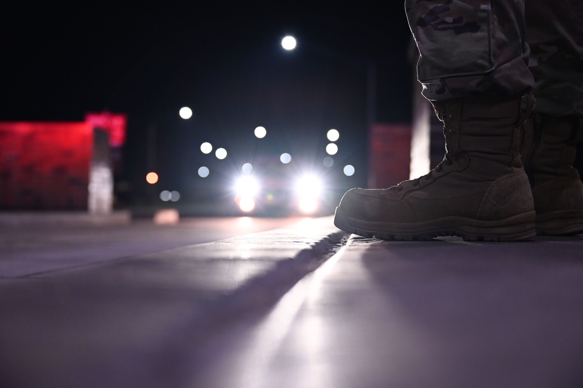 Airman 1st Class Maria Nunez, 375th Security Forces Squadron installation entry controller, prepares to scan a common access card at the Shiloh Gate, March 16, 2021 at Scott Air Force Base, Il. Nunez joined the Air Force because of how inspired she was by her Junior Reserve Officer Training instructors. (U.S. Air Force photo by Senior Airman Dalton Williams)