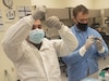 Spcs. Ariel Arroyo and Douglas Napier, with the 95th Medical Detachment-Blood Support, perform quality control on deglycerolized blood products at Camp Humphreys, South Korea. (Photo Credit: Sgt. Tao McCarthy)