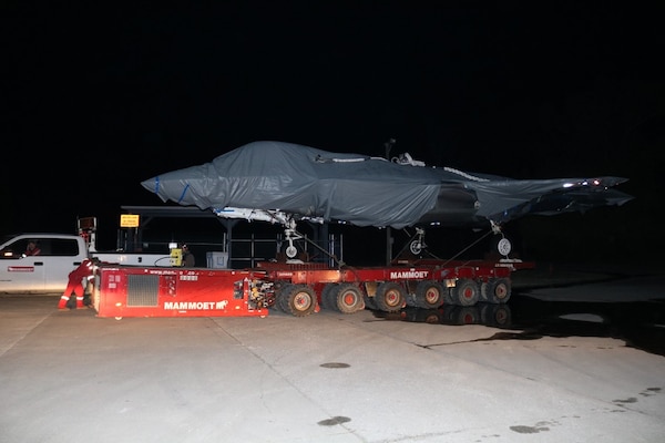 Transportation specialist move a stripped-down F-35 airframe.