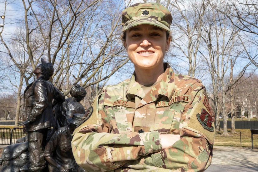 A female Air Force officer poses for a portrait.