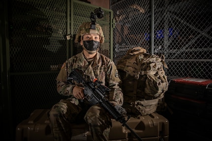 Sgt. Serita Unin, a fireteam leader with Bison Company, 1st Battalion, 297th Infantry Regiment, Alaska Army National Guard, poses for a photo on Joint Base Elmendorf-Richardson, Alaska, March 16, 2021. Unin made Alaska National Guard history by becoming the first infantry qualified woman in the organization after she reclassified into the infantry military occupational specialty last month. (U.S. Army National Guard photo by Edward Eagerton)