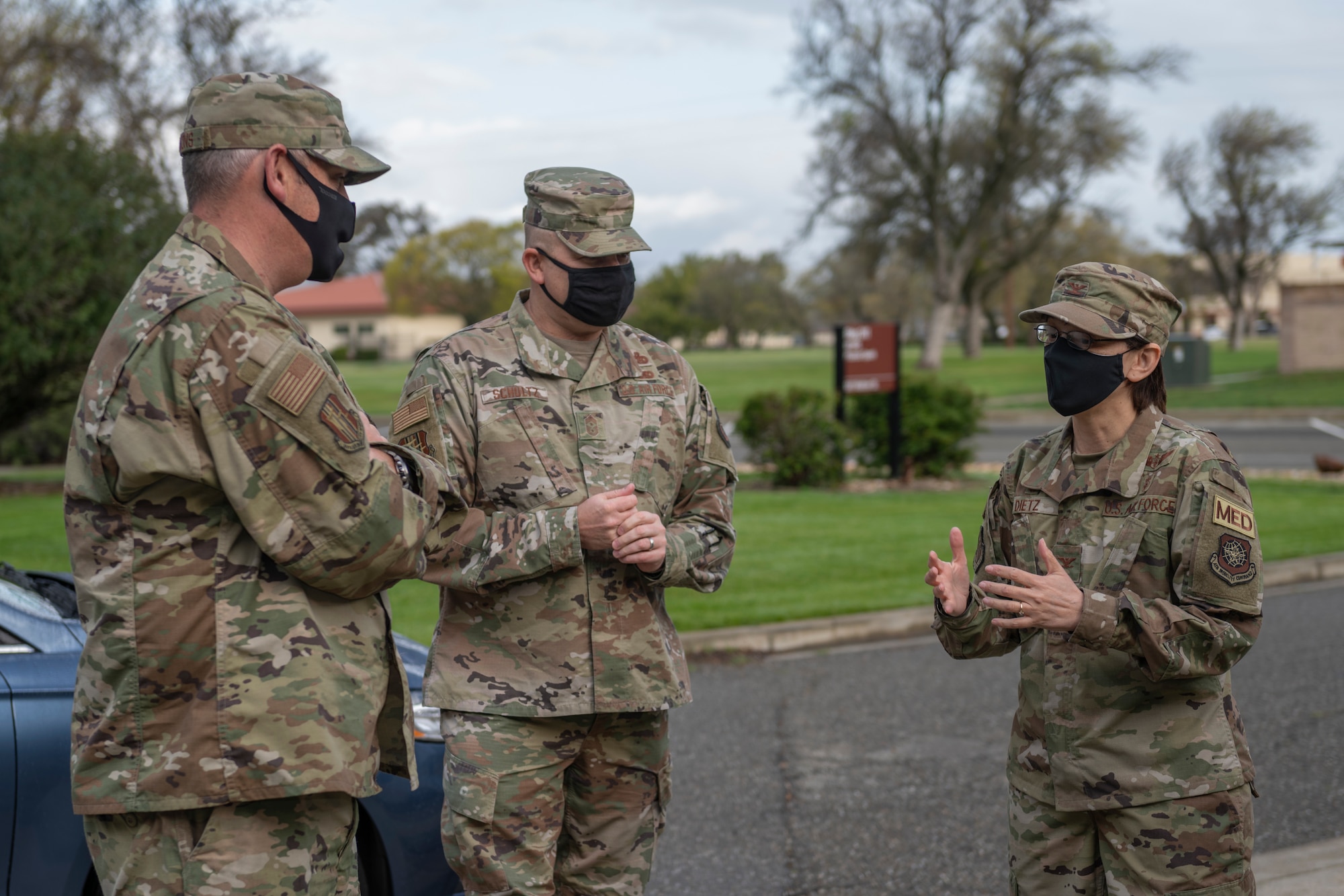 U.S. Air Force Col. Suzie Dietz, right, 60th Aeromedical Evacuation Squadron commander, interacts with Col. Corey Simmons, left, 60th Air Mobility Wing commander, and Chief Master Sgt. Robert Schultz, 60th AMW command chief, March 19, 2021, at Travis Air Force Base, California. The Leadership Rounds program provides 60th AMW leadership an opportunity to interact with Airmen and receive a detailed view of each mission performed at Travis AFB. (U.S. Air Force photo by Senior Airman Cameron Otte)