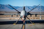 An MQ-9 sits on the flightline.