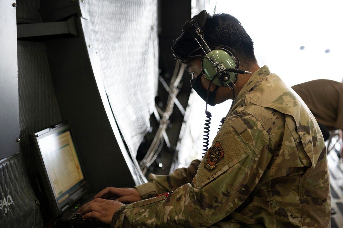 U.S. Air Force Staff Sgt. Ruzel Ditan, 60th Aircraft Maintenance Squadron crew chief, troubleshoots technical data from the cargo winch on a C-5M Super Galaxy March 18, 2021 Travis Air Force Base, California. Travis Airmen collaborated with the Air Staff Logistics Directorate’s Tesseract team and key partners from the C-5 program office to implement commercial maintenance practices in scheduling and completing maintenance around flying demands. (U.S. Air Force photo by Airman 1st Class Alexander Merchak)