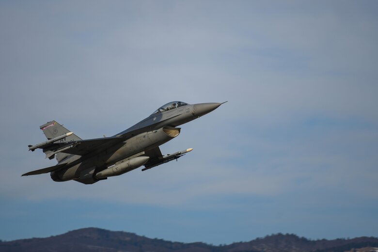 A U.S. Air Force F-16 Fighting Falcon assigned to the 510th Fighter Squadron soars above Aviano Air Base, Italy, March 22, 2021. Increase flying operations are key to the success of maintaining the 31st Fighter Wing’s ‘Adapt, Deter, Dominate’ capabilities. The 555th FS projects power across air, space and cyber domains, defends United States interests, demonstrates warfighting readiness, and forges partnerships in support of United States European Command and United States Africa Command Campaign objectives. (U.S. Air Force photo by Senior Airman Ericka A. Woolever)