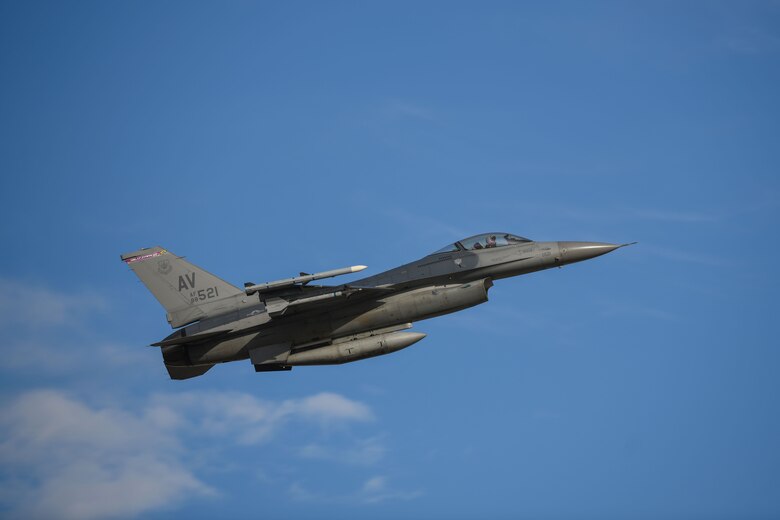 A U.S. Air Force F-16 Fighting Falcon assigned to the 510th Fighter Squadron flies above Aviano Air Base, Italy, March 22, 2021. The increased number of training requirements for both the 31st Operations Group and the 31st Maintenance Group provided critical training to ensure they are a ready and capable force. Flying operations are key to the success of maintaining a free and open United States European Command and United States Africa Command. (U.S. Air Force photo by Senior Airman Ericka A. Woolever)