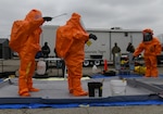 Members of the Michigan National Guard’s 51st Civil Support Team run through decontamination procedures during Northern Exposure 21, March 16, 2021, at Mount Pleasant, Michigan. Northern Exposure 21 was integrated with another exercise known as Rising Waters 2021. This year's scenario was catastrophic flooding leading to chemical contamination, which was followed by a possible WMD situation.