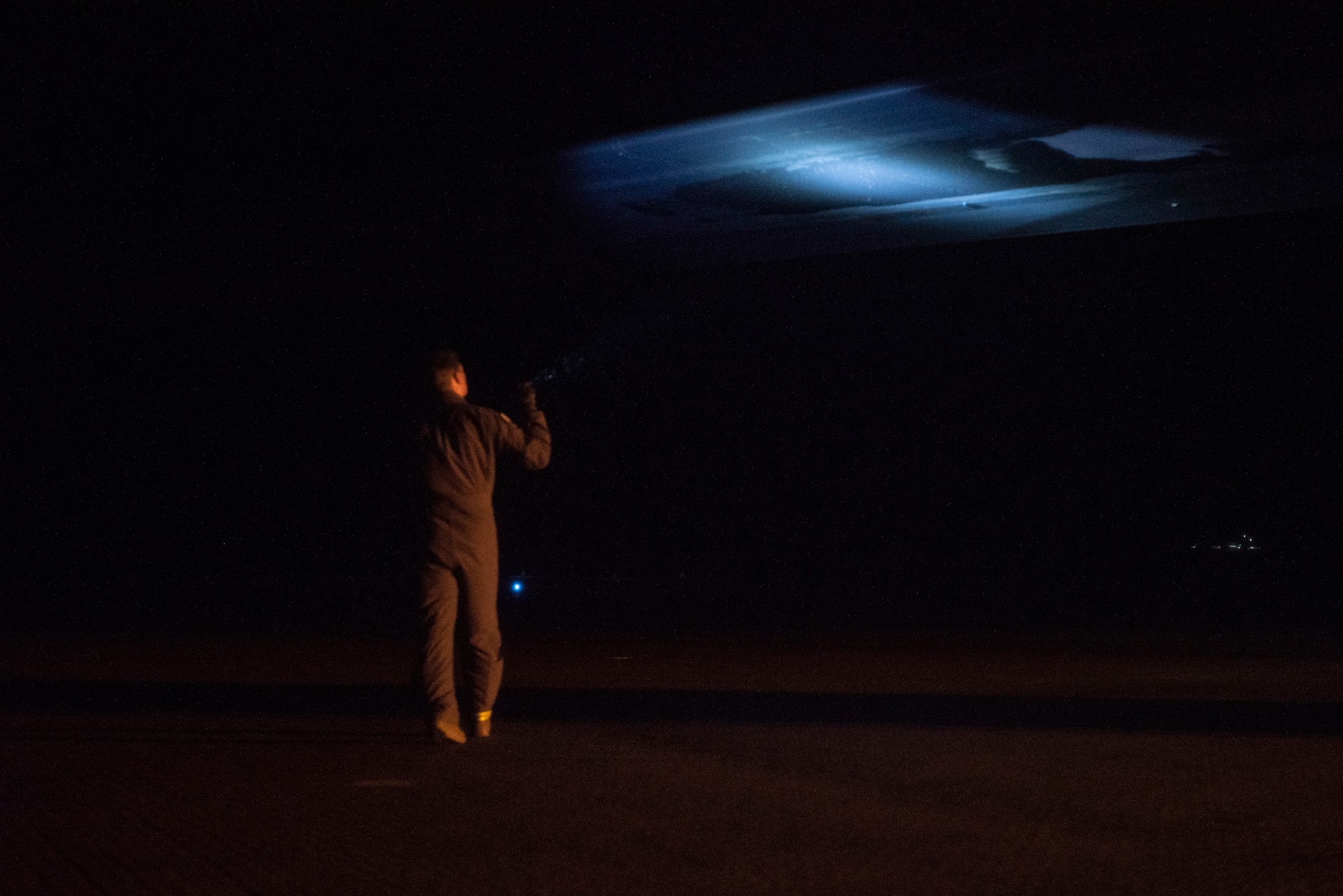 A pilot assigned to the 9th Expeditionary Bomb Squadron conducts a structure check on a B-1B Lancer upon landing at Ørland Air Force Station, Norway, March 19, 2021. Aircraft routinely undergo general structural inspections to ensure the plane hasn’t sustained any exterior impairments. (U.S. Air Force photo by Airman 1st Class Colin Hollowell)