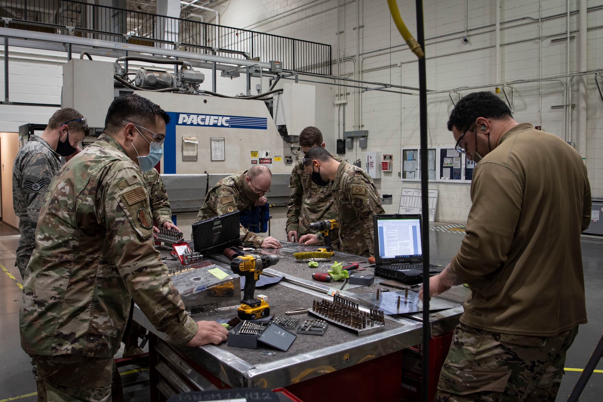 Photo of Airmen completing hands-on training.