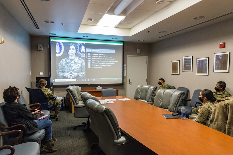Members of the 436th Aerial Port Squadron watch a video during the one-day extremism standdown on Dover Air Force Base, Delaware, March 19, 2021. Unit facilitators used the Pathway to Extremism curriculum to educate Team Dover Airmen and Guardians. Secretary of Defense Lloyd J. Austin III directed the departmentwide standdown to discuss problems of extremism in the ranks and train members on taking appropriate action to combat extremism. (U.S. Air Force photo by Roland Balik)