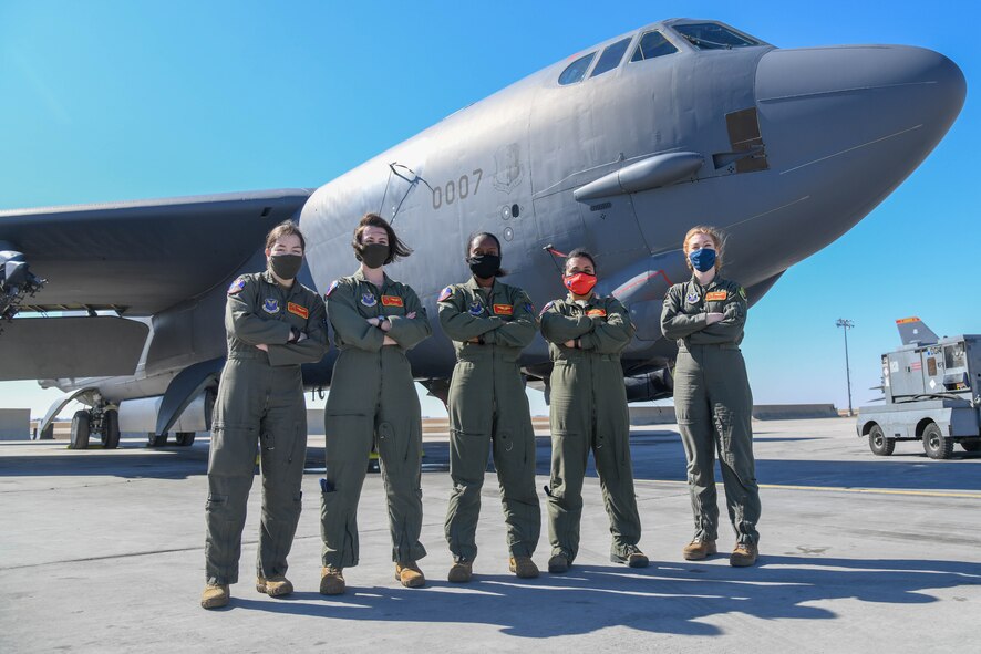 Team Minot’s Female Electronic Warfare Officers and Weapons System Officers pose in front of a B-52H Stratofortress on Minot Air Force Base, North Dakota, March 18, 2021. These women call themselves the baronesses and work in the 23rd Bomb Squadron. (U.S. Air Force photo by Airman Allison Martin)