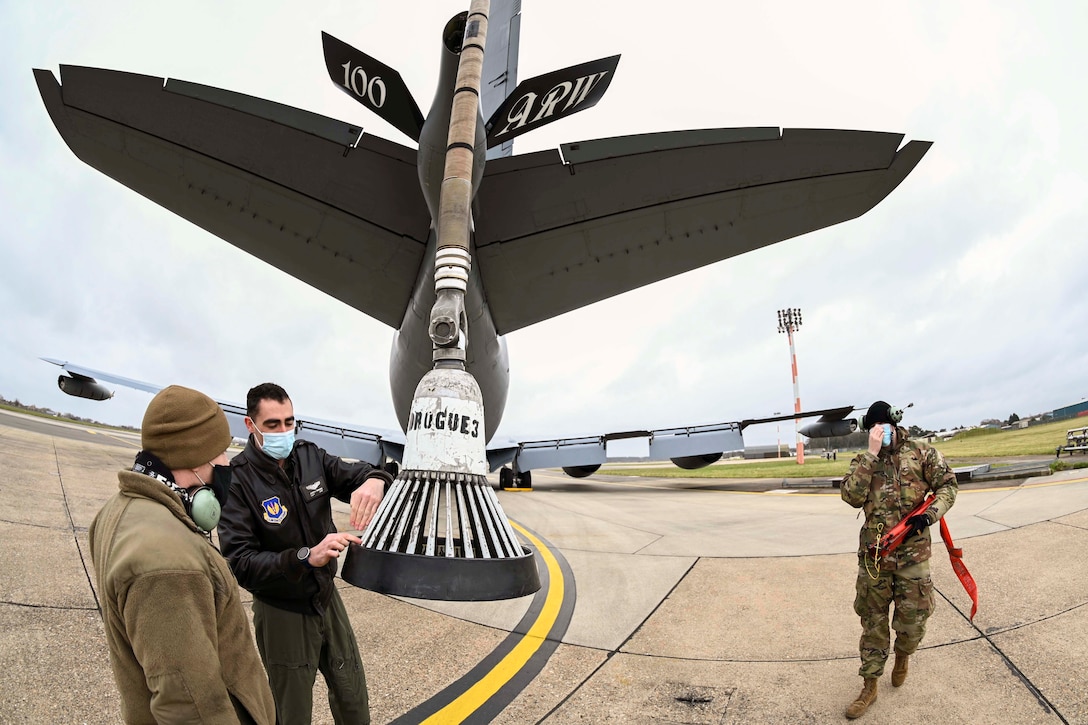 Airmen work on an aircraft.