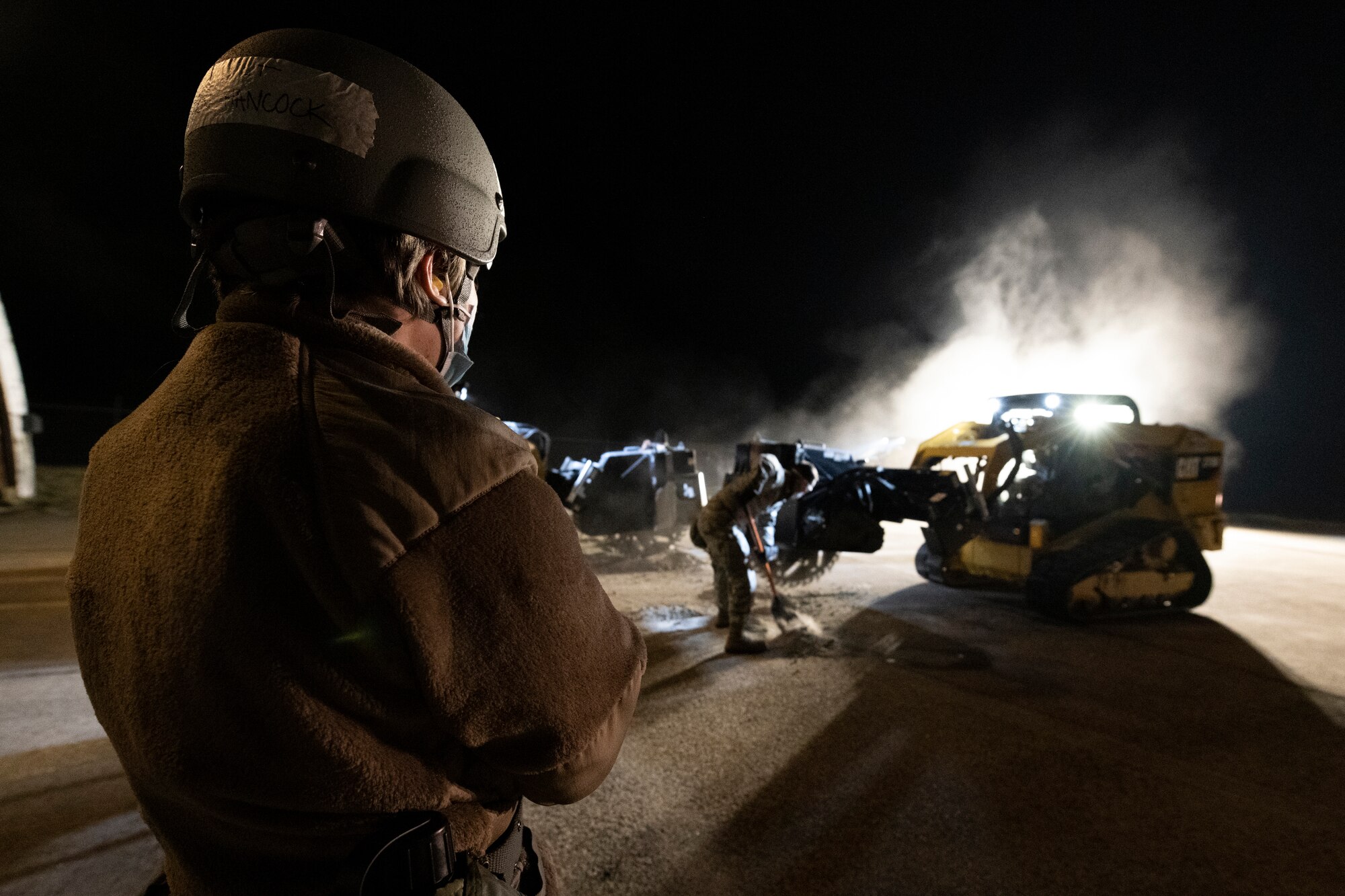 U.S. Air Force Airmen from the 52nd Civil Engineer Squadron’s Rapid Airfield Damage Recovery team conduct runway repair operations as part of the AGILE SABRE exercise on Spangdahlem Air Base, Germany, March 23, 2021.