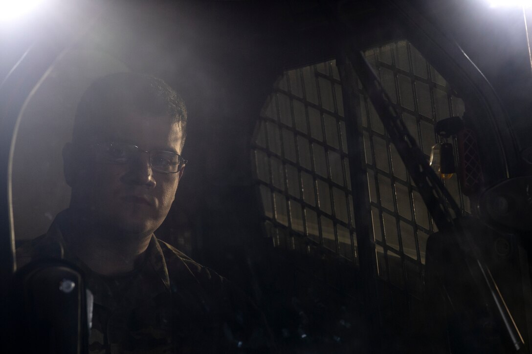 U.S. Air Force Staff Sgt. Joshua Dane, 52nd Civil Engineer Squadron’s Rapid Airfield Damage Recovery team member, operates compact tracked loader during runway repair operations as part of the AGILE SABRE exercise on Spangdahlem Air Base, Germany, March 23, 2021.