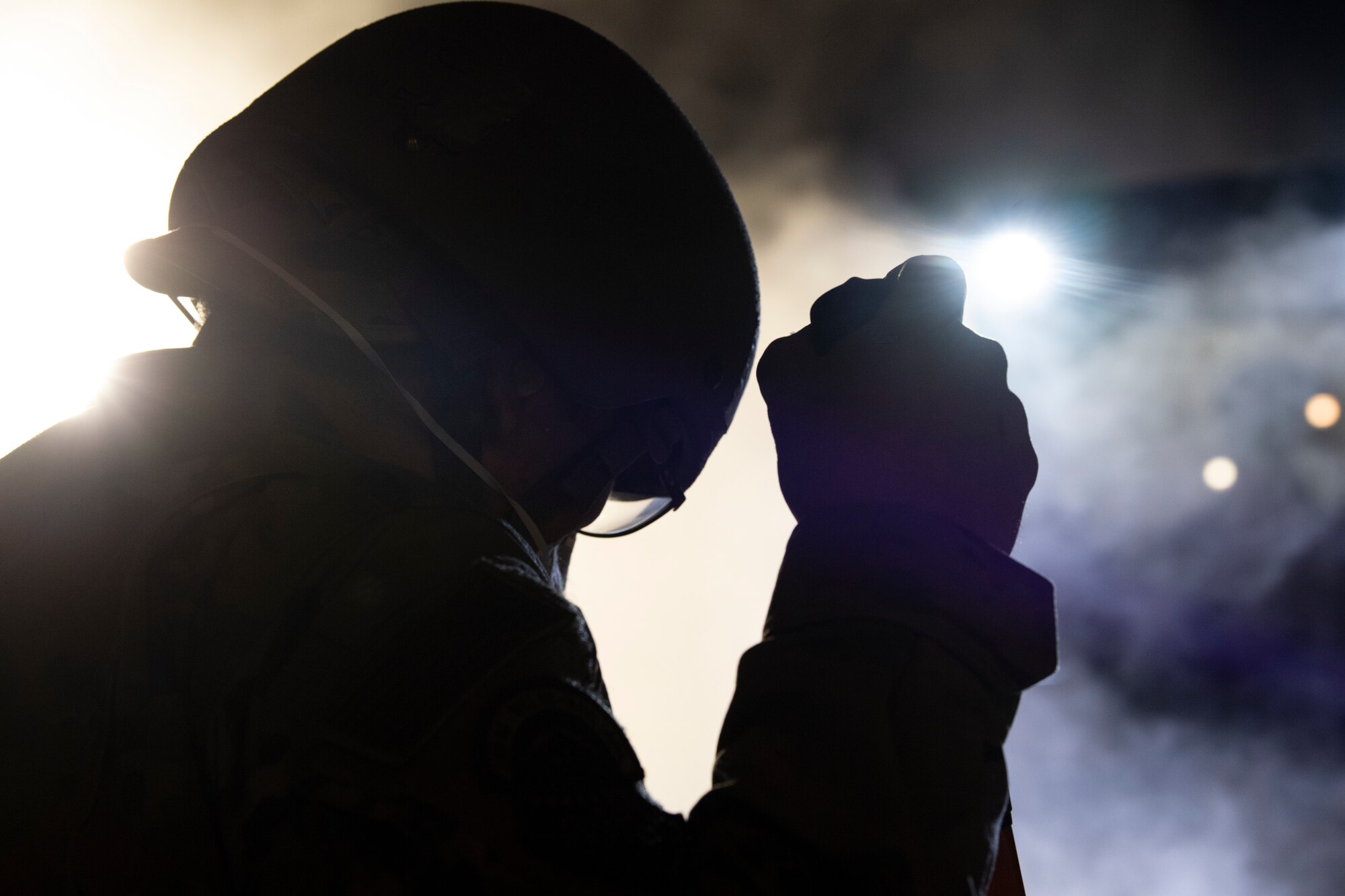 A U.S. Air Force Airman from the 52nd Civil Engineer Squadron’s Rapid Airfield Damage Recovery team guides a compact tracked loader during runway repair operations as part of the AGILE SABRE exercise on Spangdahlem Air Base, Germany, March 23, 2021.