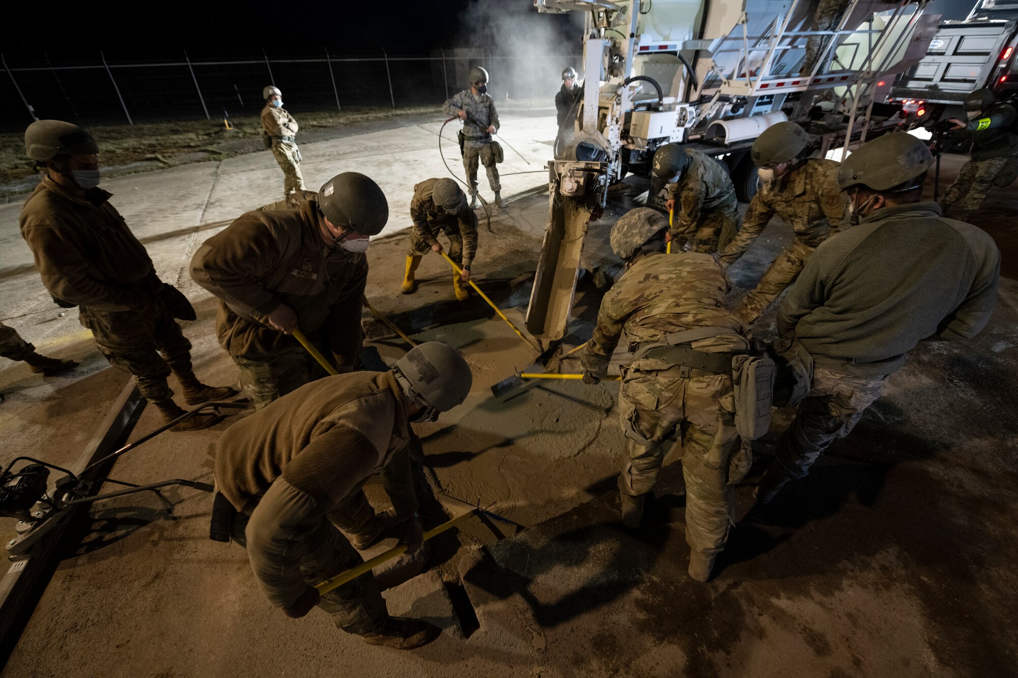 U.S. Air Force Airmen from the 52nd Civil Engineer Squadron’s Rapid Airfield Damage Recovery team conduct runway repair operations as part of the AGILE SABRE exercise on Spangdahlem Air Base, Germany, March 23, 2021.
