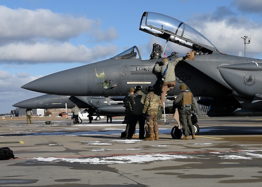 48th Aircraft Maintenance Squadron Airmen prepare an F-15E Strike Eagle to return to Royal Air Force Lakenheath, England, from Amari Air Base, Estonia after completion of Baltic Trident March 19, 2021. Baltic Trident was centered on the Agile Combat Employment concept of operations, showcasing the 48th Fighter Wing’s multi-capable Airmen and their ability to effectively carry out the mission away from home station with varying levels of support and a smaller manpower footprint. (U.S. Air Force photo by Airman 1st Class Jessi Monte)