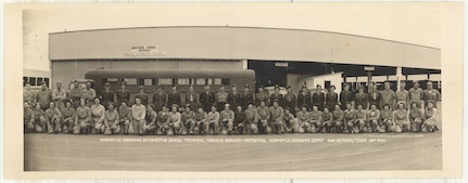 Men and women of the Normoyle Ordnance Automotive School pause for a photograph, January 1944, at Kelly Field, Texas. The women pictured were part of a workforce locally known as “Kelly Katies”; women recruited to fill non-traditional jobs during World War II. (Courtesy photo)
