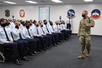 U.S. Air Force Tech. Sgt. Alvin Morris, 336th Training Squadron military training leader, conducts a professional development brief inside the Levitow Training Support Facility at Keesler Air Force Base, Mississippi, Feb. 25, 2021. The Master Military Training Leader Program, created at Keesler, was designed to distinguish the military training leaders who have mastered the demonstration, evaluation and reinforcement of military standards; exude military bearing and discipline while scheduling and conducting military training; and are key leaders among Airmen and their peers. (U.S. Air Force photo by Kemberly Groue)