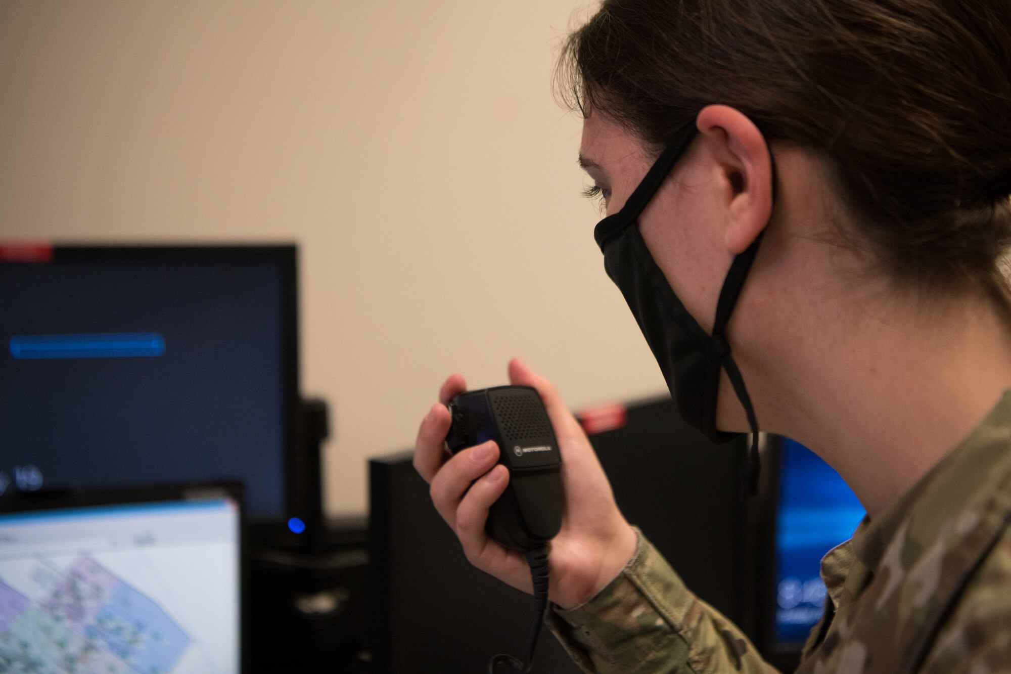 Airman speaks into radio