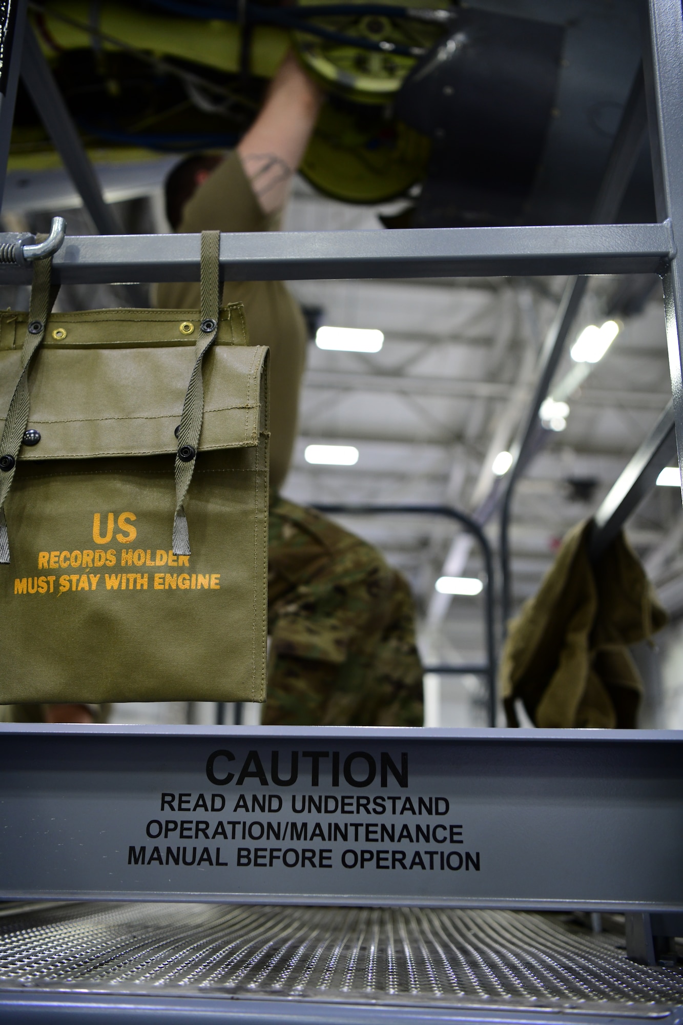 Staff Sgt. John Lawless,434th Maintenance Squadron metals technician, replaces the rolling pins within the boom controls of a KC-135R Stratotanker, March 13, 2021, Grissom Air Reserve Base, Indiana. The aircraft was receiving maintenance overall, because the boom was unable to lower itself down far enough to meet the receiving aircraft. (U.S. Air Force photo by Staff Sgt. Alexa Culbert)