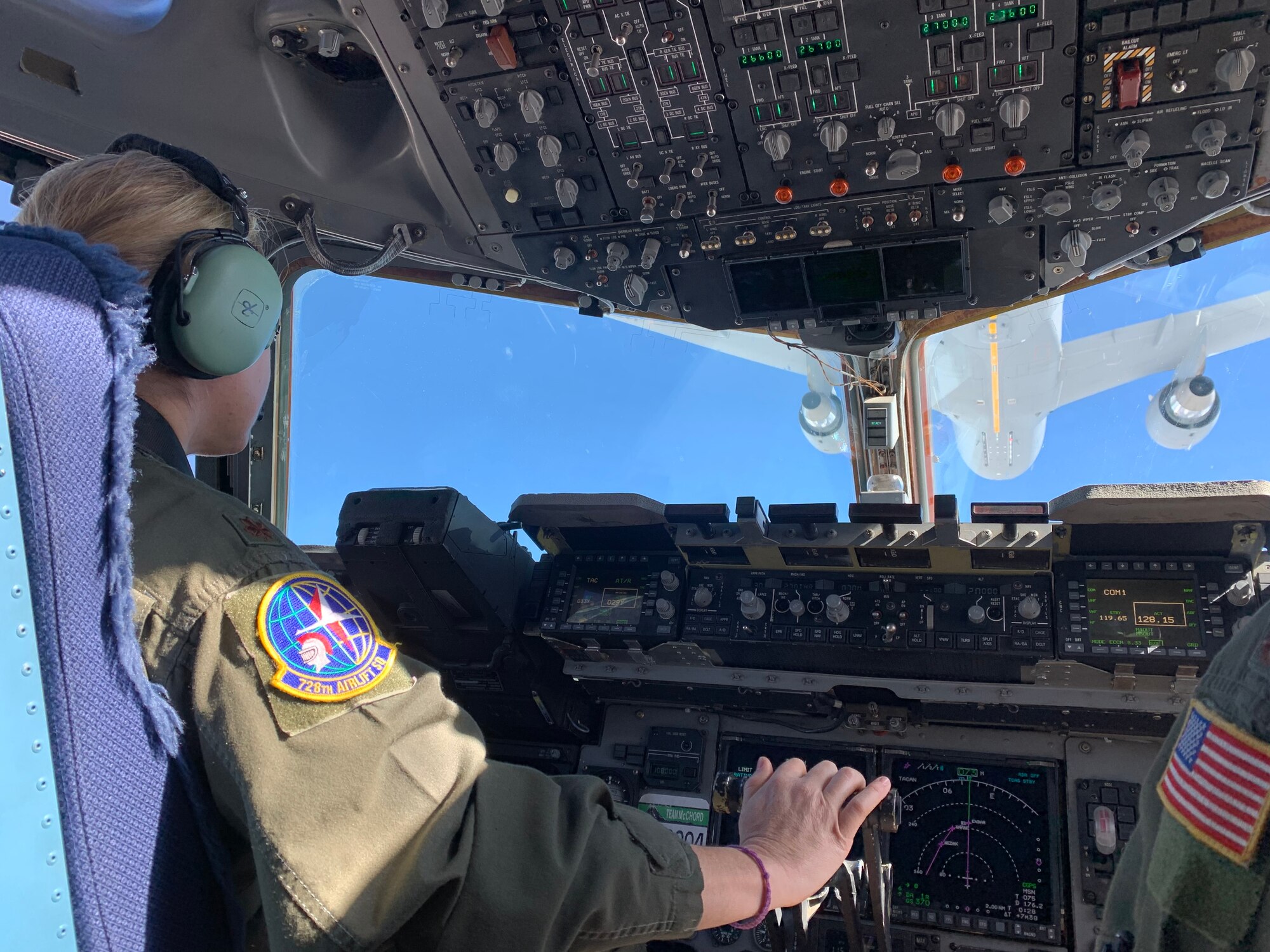 Maj. Emily Yturralde, an Air Force Reserve pilot assigned to the 728th Airlift Squadron here, receives fuel on March 11, 2021, from the newest tanker in the Air Force fleet, a KC-46 Pegasus.