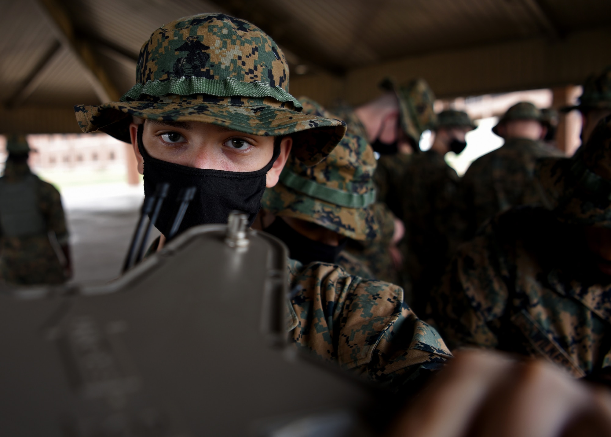 U.S. Marine Corps Pfc. Dante Rivera, Marine Corps Detachment Tactical Signals Intelligence Operator course student, unscrews the antennas to the versatile radio observation and direction finder after completing a field exercise outside of the MCD dormitories on Goodfellow Air Force Base, Texas, March 22, 2021. Goodfellow falls under Air Education and Training Command and offers exceptional training for all branches of the military and America’s Allies. (U.S. Air Force photo by Senior Airman Abbey Rieves)