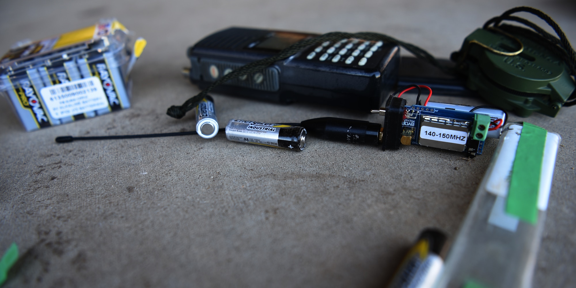 Batteries, transmitters, antennas and other intelligence equipment collect in the pavilion behind the Marine Corps Detachment, on Goodfellow Air Force Base, Texas, March 23, 2021. Joint service students in the MDC unitize the intelligence equipment to intercept radio signals in training priorities set by the Department of Defense. (U.S. Air Force photo by Senior Airman Abbey Rieves)