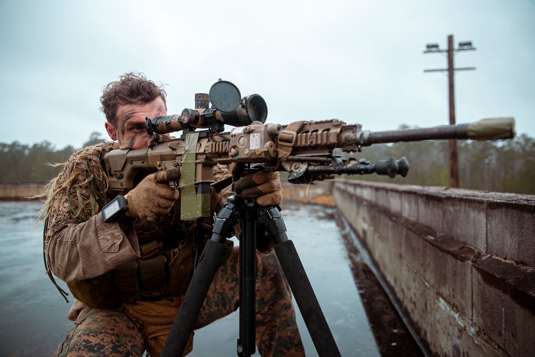 U.S. Marine Corps Cpl. Reed Bunyard, a native of Columbia, Md., and a reconnaissance Marine with 2d Reconnaissance Battalion (Recon Bn.), 2d Marine Division, posts security during Exercise Caribbean Urban Warrior on Camp Lejeune, N.C., March 22, 2021. The exercise is a bilateral training evolution designed to increase global interoperability between 2d Recon Bn. and 32nd Raiding Squadron, Netherlands Marine Corps. (U.S. Marine Corps photo by Lance Cpl. Jacqueline Parsons)