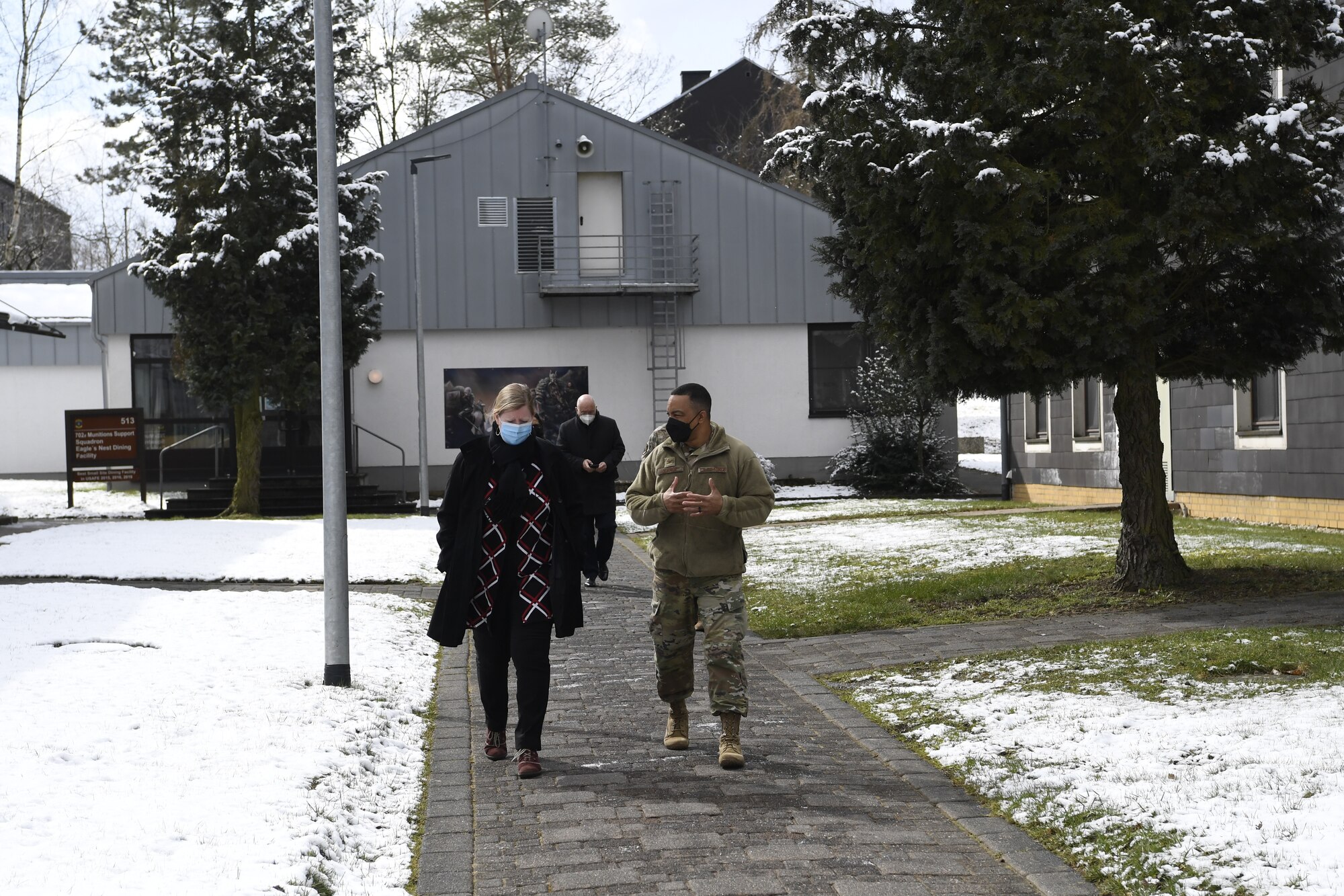 U.S. Air Force Colonel Michael Clancy, Commander or the 52nd Munitions Maintenance Group at Spangdahlem Air Base Germany (right), talks with Erin Sawyer, the new senior foreign policy advisor to the commander of United States Air Forces Europe and Air Forces Africa while visiting the 702nd Munitions Support Squadron at Buechel Air Base, Germany, March 19, 2021.
