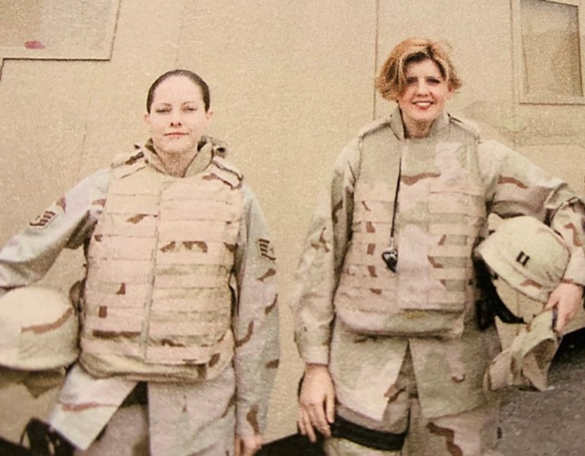 Then Staff Sgt., now Maj. Debora Berg (left), current 436th Contracting Squadron commander, and then Capt. Renee Russo (right), current 436th CONS director of business operations, pose for a photo during their 2006 deployment to Kabul, Afghanistan. Russo served as Berg’s commanding officer in 2006. Today, their roles are reversed, as Berg oversees the unit. (Courtesy photo)