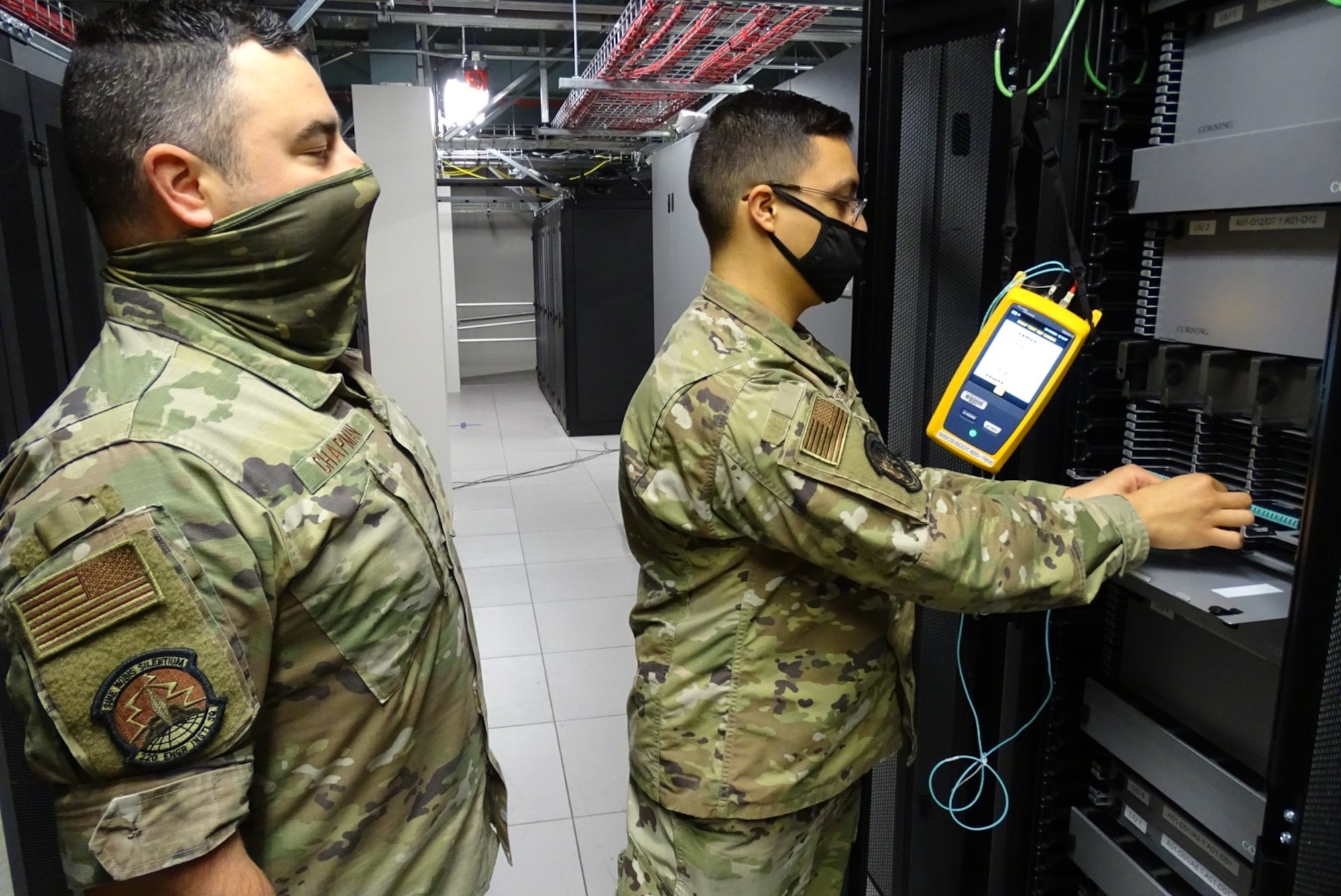 Photo of electronics and comms workers