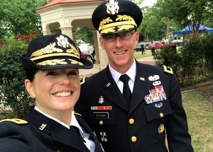 Army Reserve Brig. Gen. Cheryn L. Fasano grins for her selfie with Maj. Gen. Michael C. O'Guinn, after Fasano's 2018 promotion to her current rank.