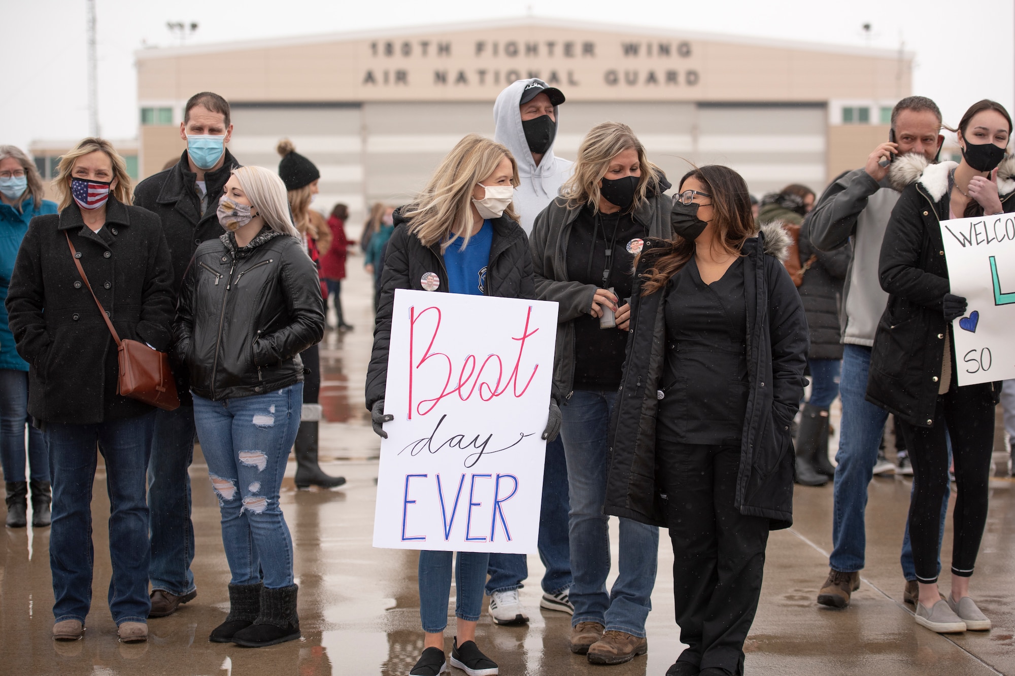 Friends and family wait to welcome Airmen home from deployment, Jan. 26, 2020 at the 180FW in Swanton, Ohio.