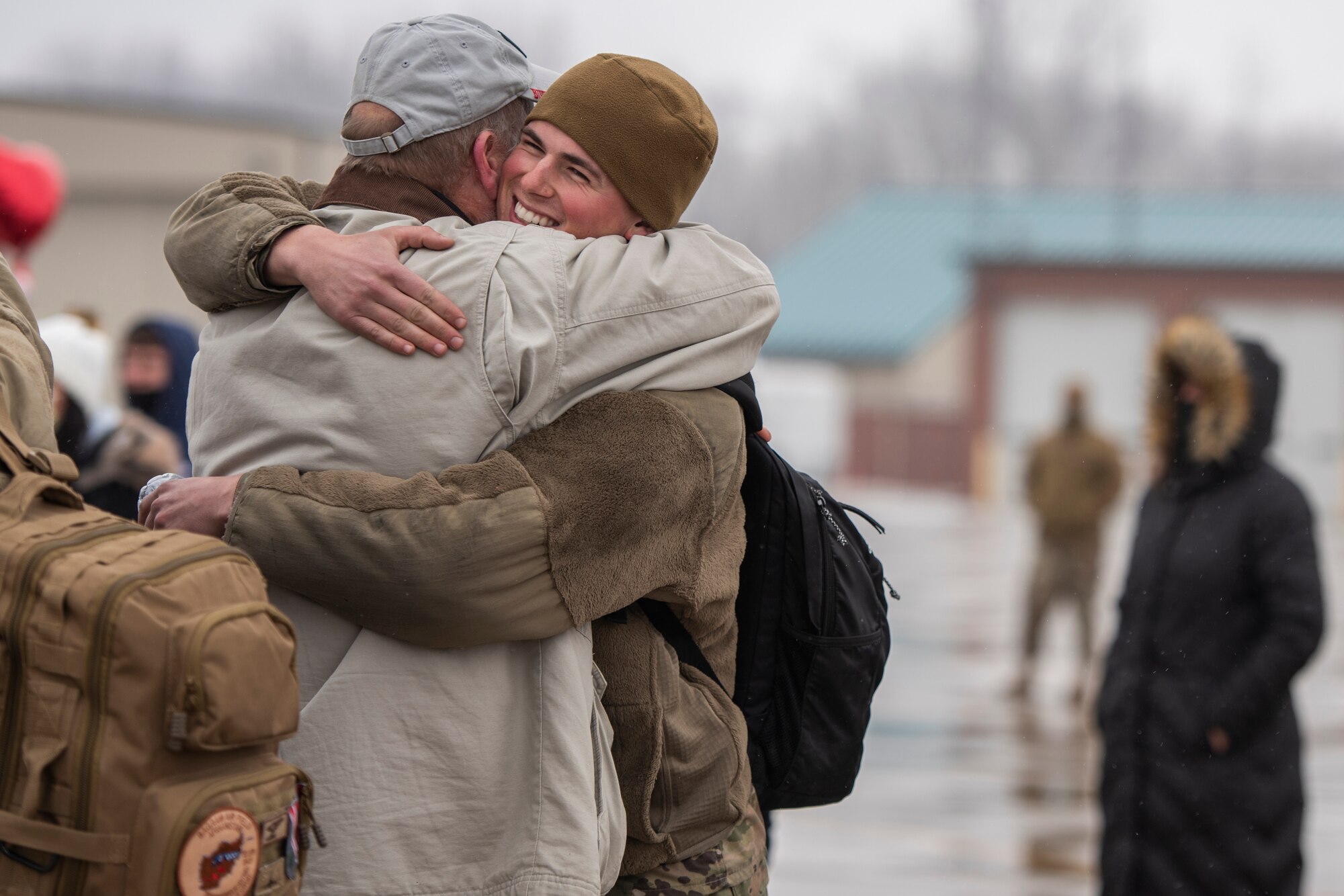 Staff Sgt. Alex Iannucci, a crew chief, assigned to the Ohio National Guard’s 180th Fighter Wing, embraces a loved one after returning home from their overseas deployment, Jan. 26, 2020 at the 180FW in Swanton, Ohio.