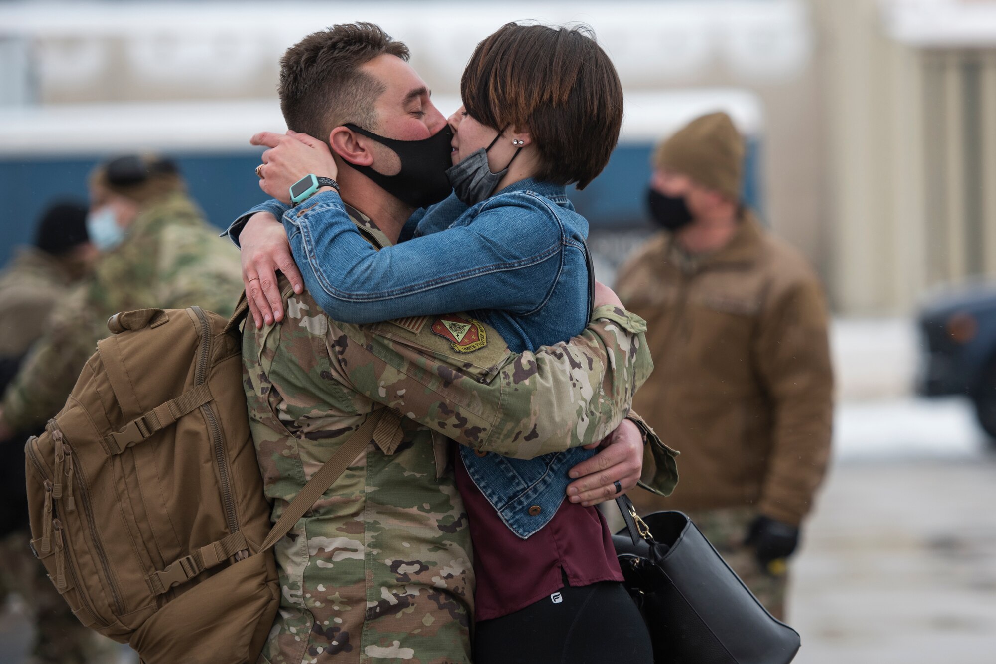 A U.S. Airman, assigned to the Ohio National Guard’s 180th Fighter Wing, embraces a loved one after returning home from an overseas deployment, Jan. 26, 2020 at the 180FW in Swanton, Ohio.