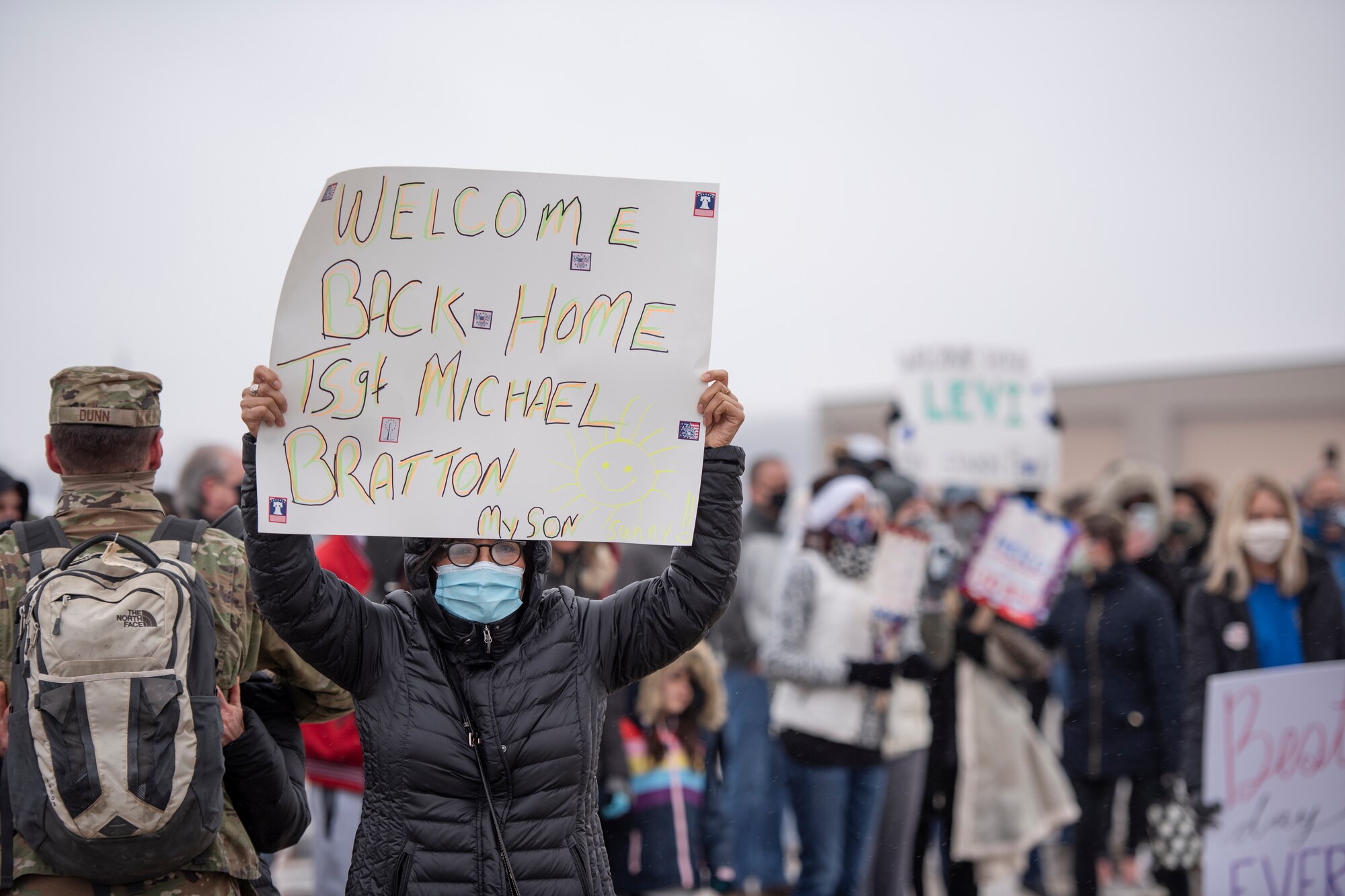 Family members await the return Airmen after an overseas deployment, Jan. 26, 2020 at the 180FW in Swanton, Ohio.